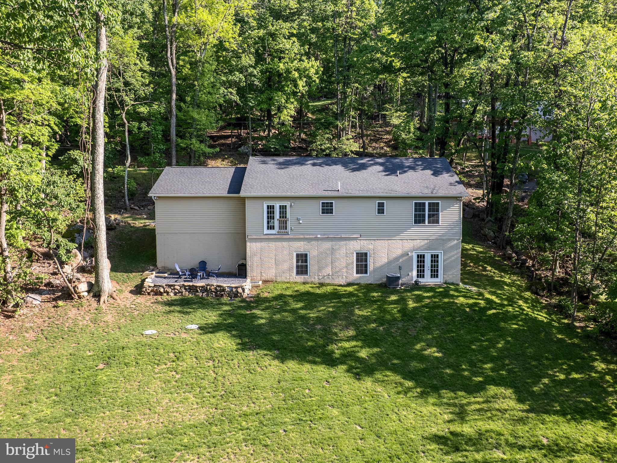 439 Windy Way Front Royal, VA 22630 - Photo 6 of 40 a aerial view of a house with a yard patio and garage
