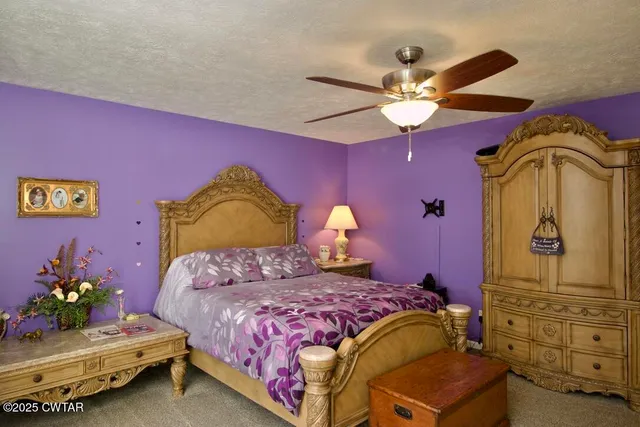 a bathroom with a double vanity sink a mirror and a shower