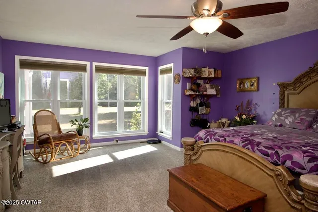 a bathroom with a sink toilet and vanity