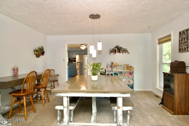 a view of front door with wooden floor