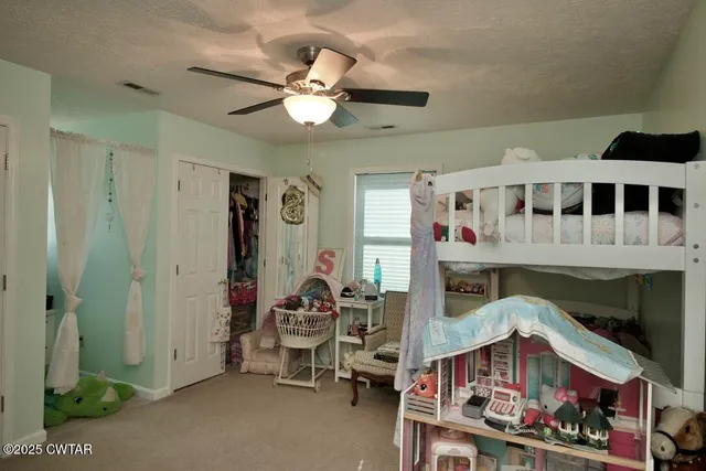 a view of staircase with white walls