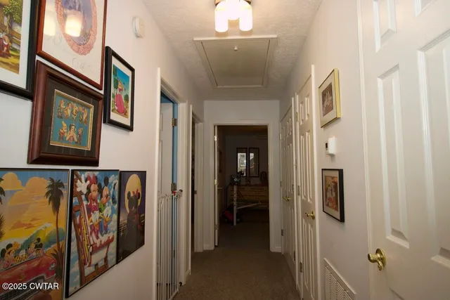 a view of swimming pool with seating space