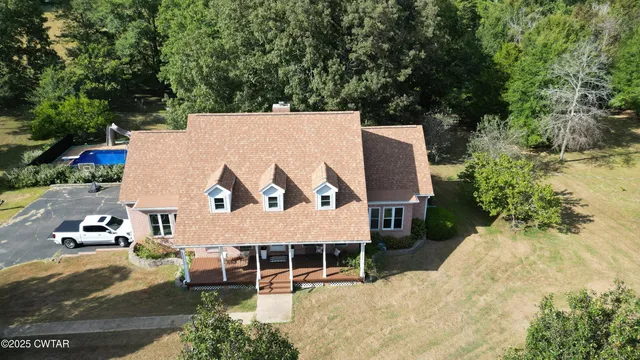 a view of a lake in middle of the house
