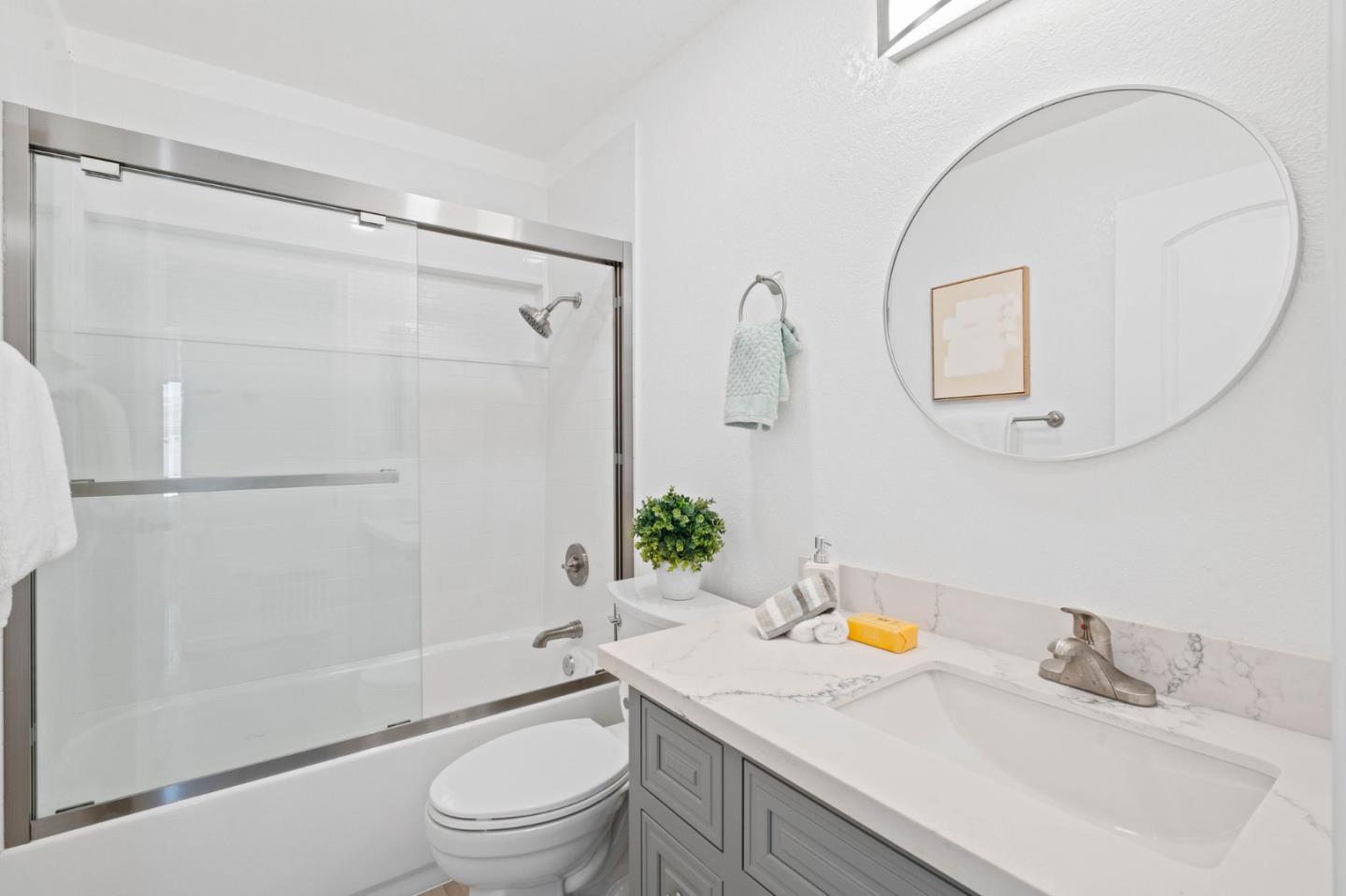 960 Cheswick Drive San Jose, CA 95121 - Photo 14 of 44 a bathroom with a sink toilet and shower