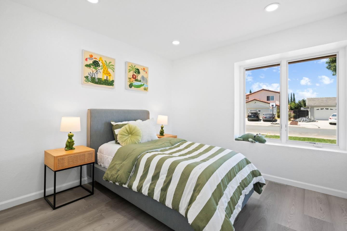 960 Cheswick Drive San Jose, CA 95121 - Photo 15 of 44 a bedroom with a bed and a large window