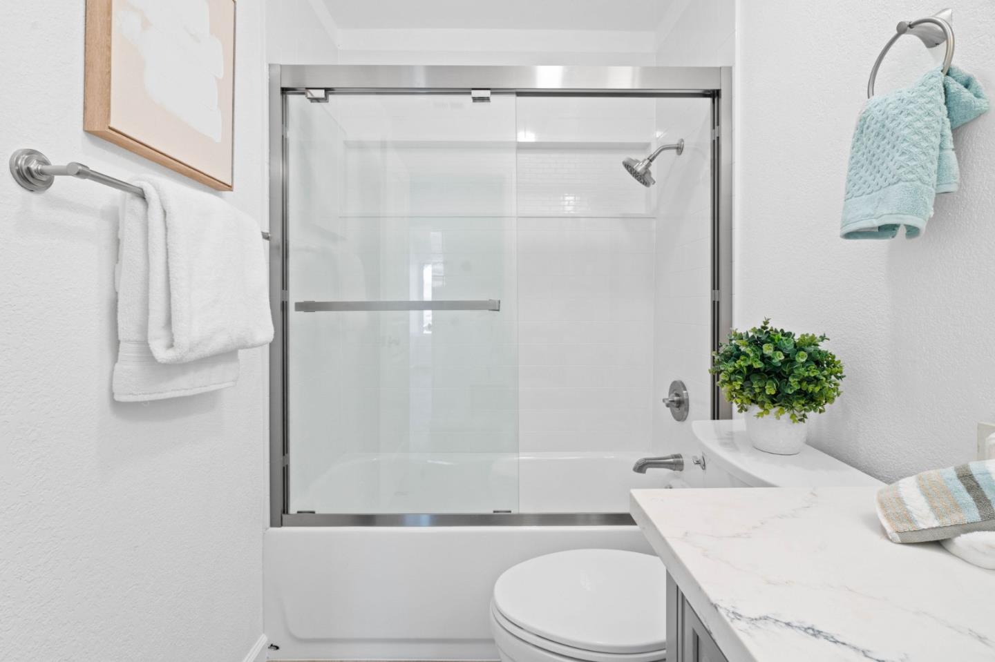 960 Cheswick Drive San Jose, CA 95121 - Photo 17 of 44 a bathroom with a sink toilet and shower