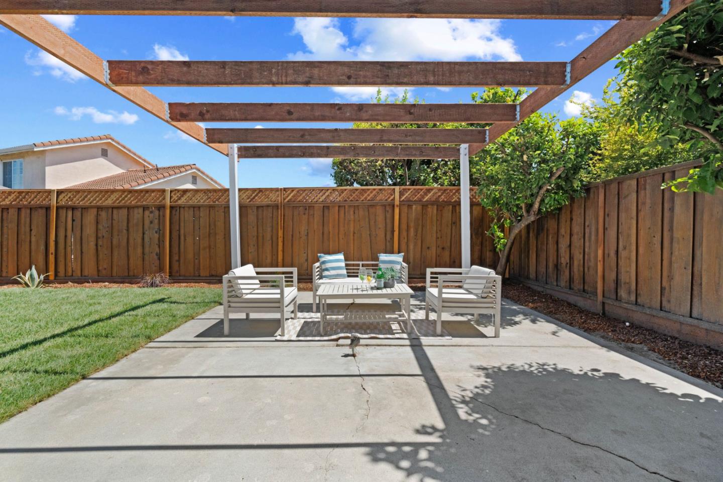 960 Cheswick Drive San Jose, CA 95121 - Photo 24 of 44 a view of backyard with a patio and a garden