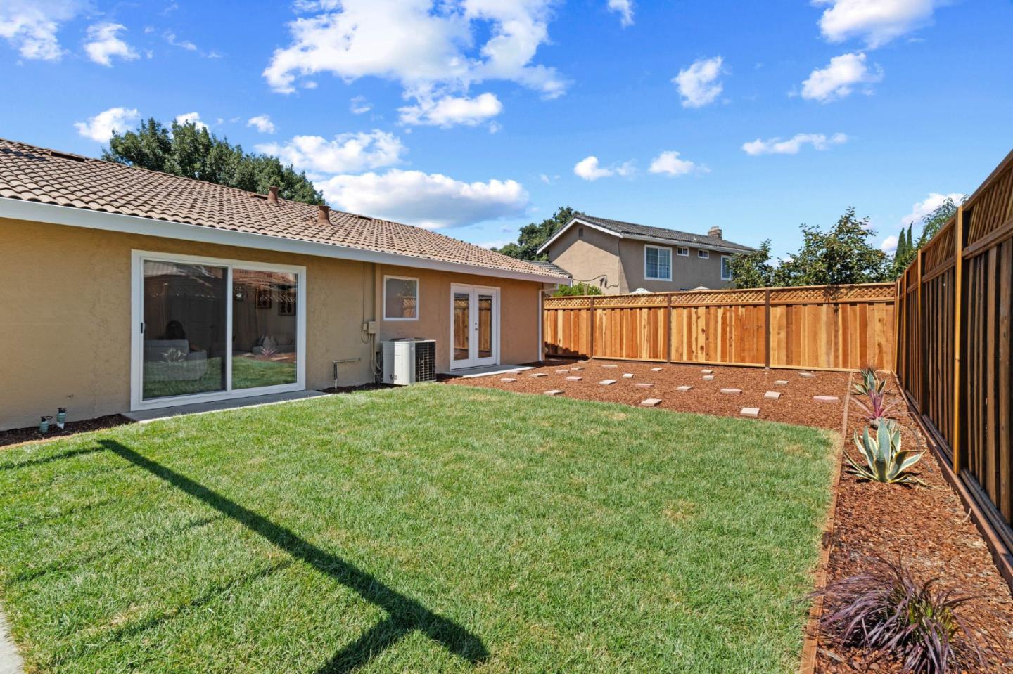 960 Cheswick Drive San Jose, CA 95121 - Photo 29 of 44 a front view of a house with garden