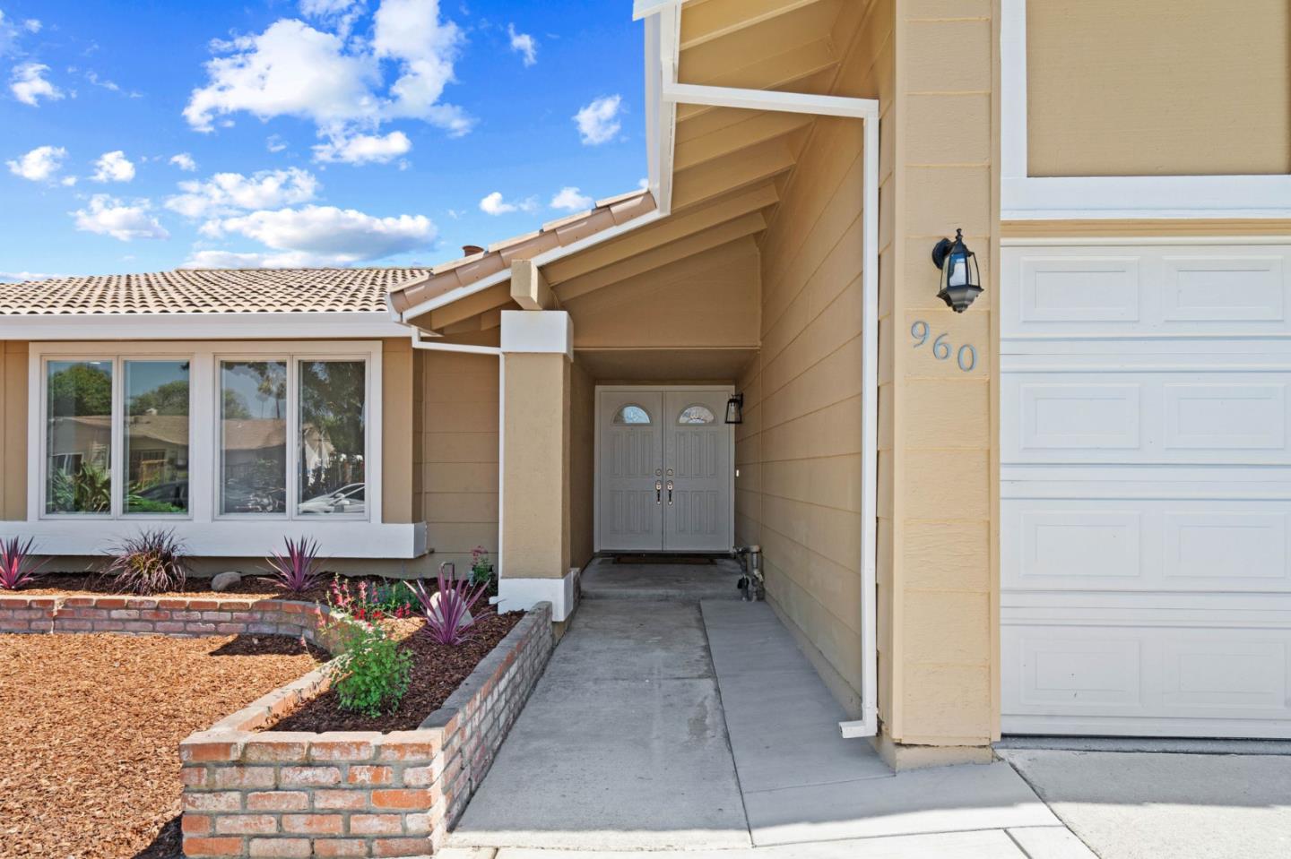 960 Cheswick Drive San Jose, CA 95121 - Photo 3 of 44 a front view of a house with outdoor seating