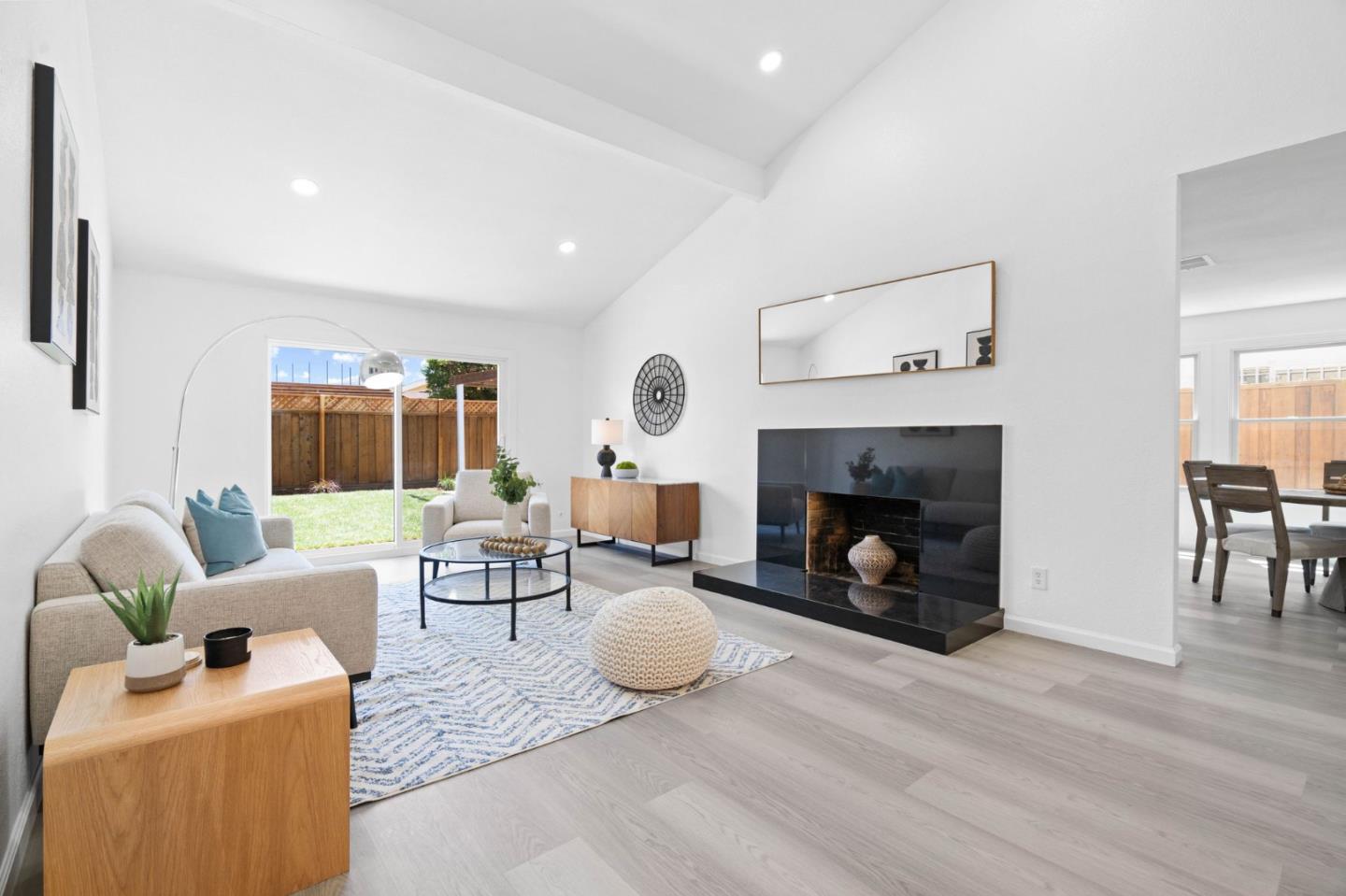 960 Cheswick Drive San Jose, CA 95121 - Photo 5 of 44 a living room with furniture and a fireplace