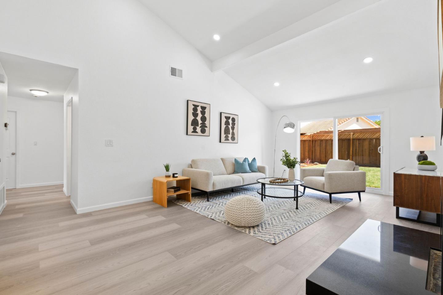 960 Cheswick Drive San Jose, CA 95121 - Photo 6 of 44 a living room with furniture and a table