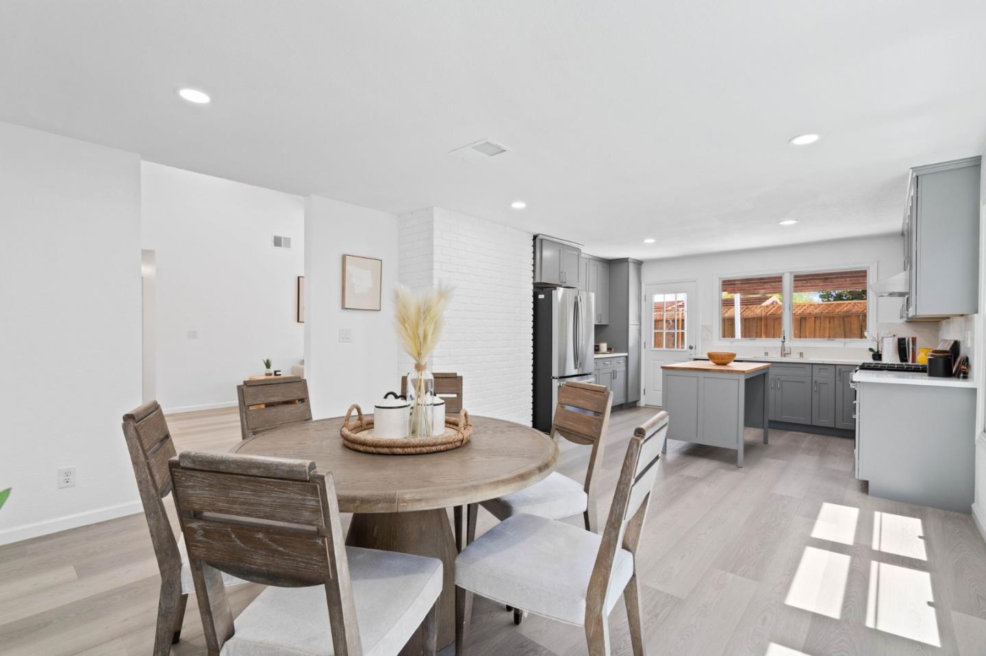 960 Cheswick Drive San Jose, CA 95121 - Photo 8 of 44 a view of a dining room with furniture and a livingroom