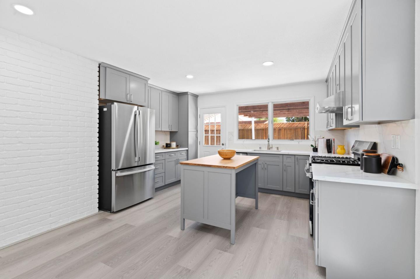 960 Cheswick Drive San Jose, CA 95121 - Photo 10 of 44 a kitchen with refrigerator and window