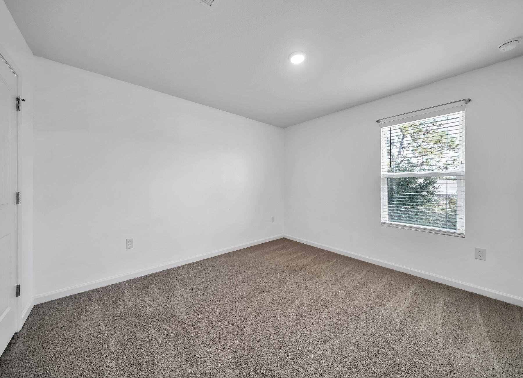 955 Merganser Way Crestview, FL 32539 - Photo 16 of 34 an empty room with a window