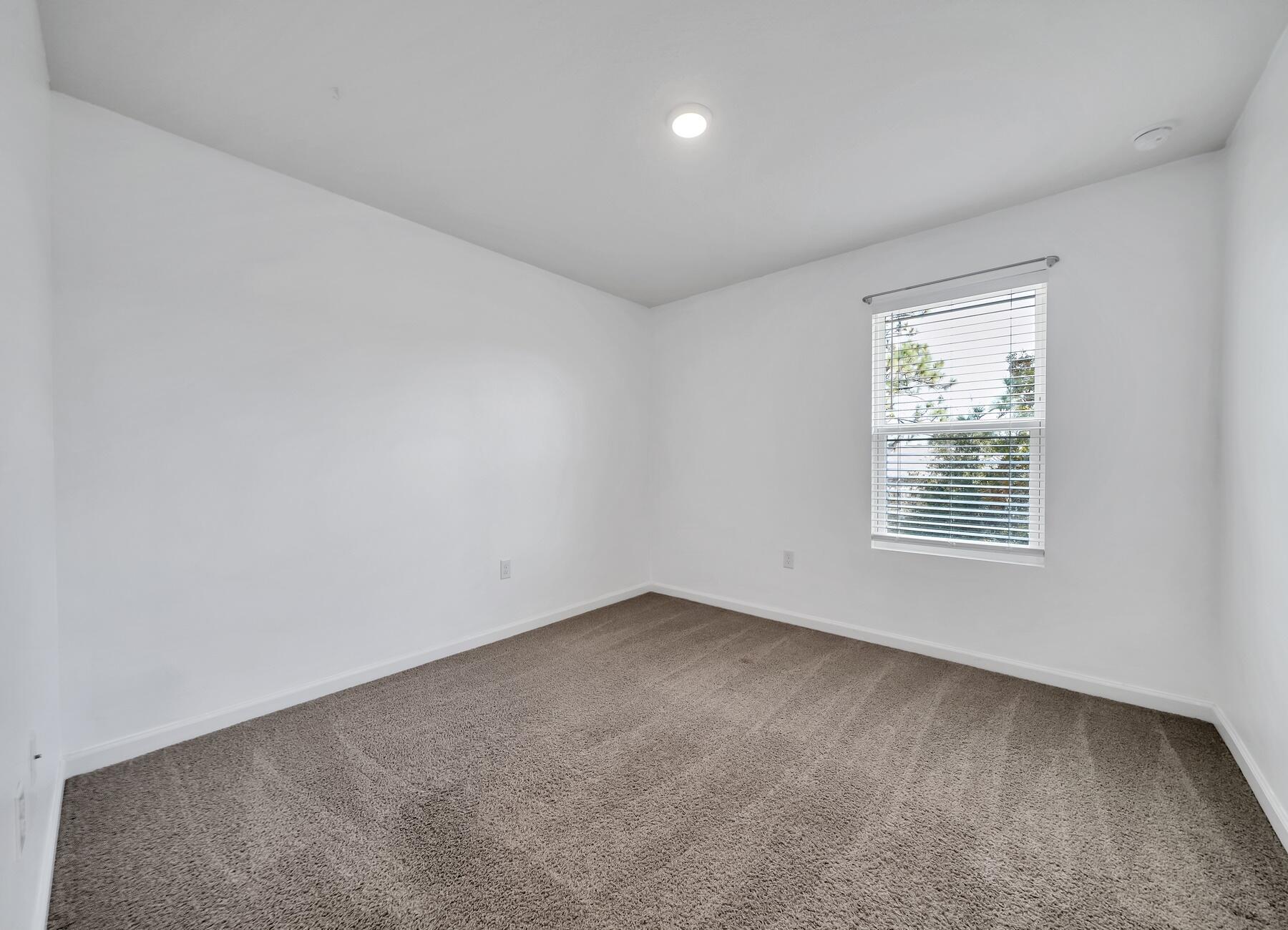 955 Merganser Way Crestview, FL 32539 - Photo 19 of 34 an empty room with a window