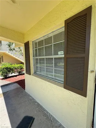 a view of a house with a large window