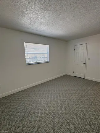 an empty room with a workbench