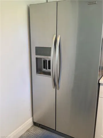 a view of a storage & utility room with a sink