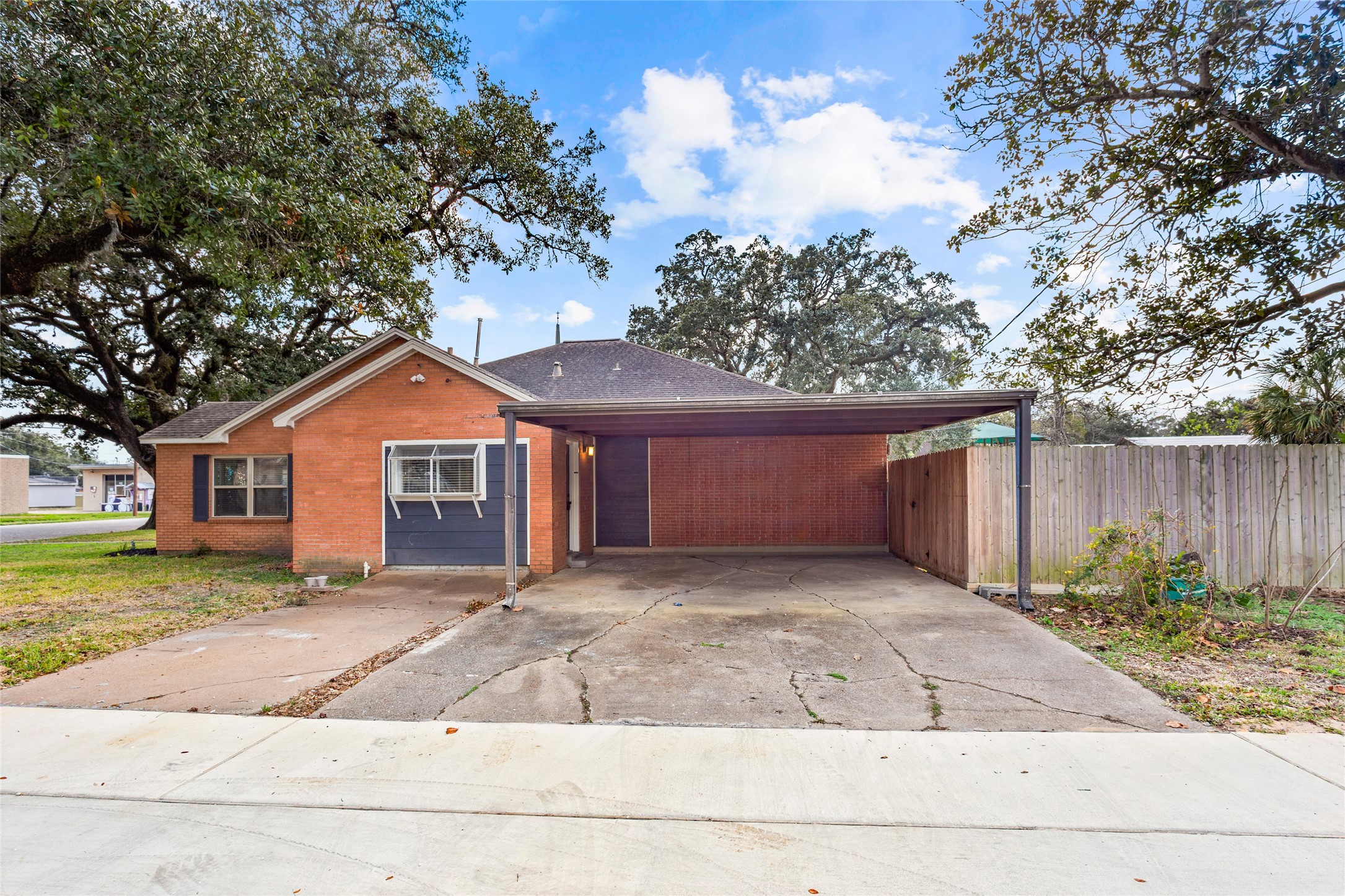 302 South Hardie Street Alvin, TX 77511 - Photo 14 of 16 Situated on a corner lot with a carport.