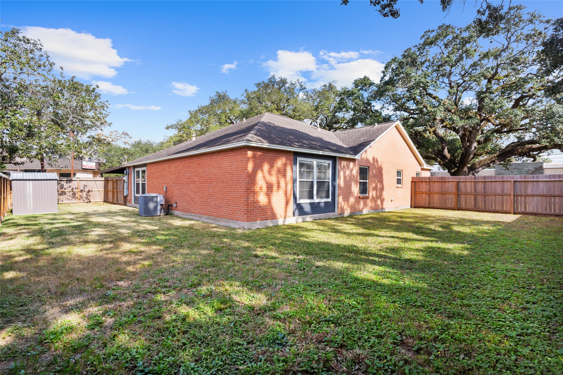302 South Hardie Street Alvin, TX 77511 - Photo 15 of 16 Large backyard!