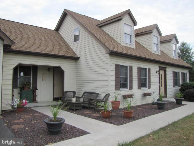 13046 Independence Road Clear Spring, MD 21722 - Photo 1 of 26 a front view of a house with patio