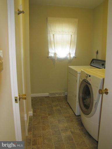 13046 Independence Road Clear Spring, MD 21722 - Photo 11 of 26 a utility room with dryer and washer