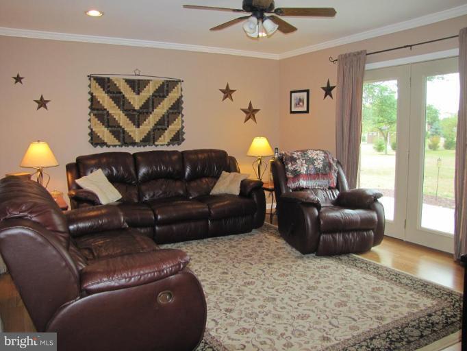 13046 Independence Road Clear Spring, MD 21722 - Photo 10 of 26 a living room with furniture and a rug