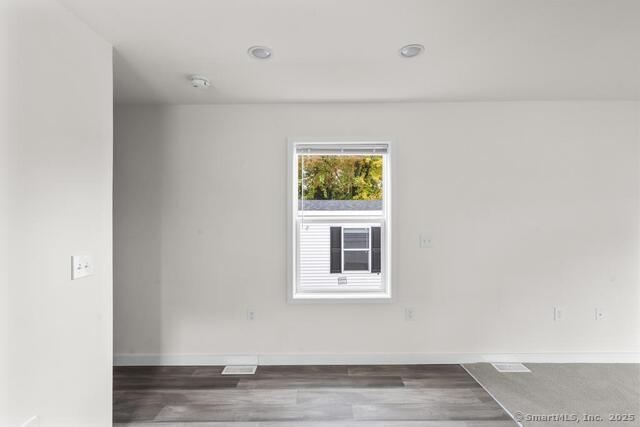 55 Sugar Street, Unit 27 Newtown, CT 06470 - Photo 11 of 17 a view of a livingroom and window