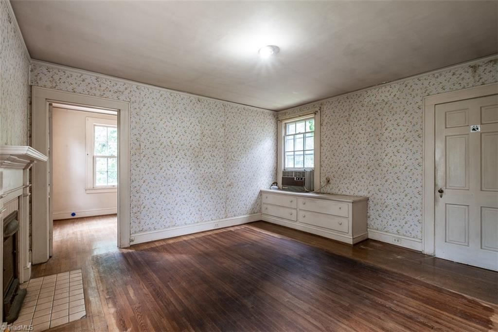 124 Hawthorne Road Elkin, NC 28621 - Photo 22 of 42 Staircase leading to second level.