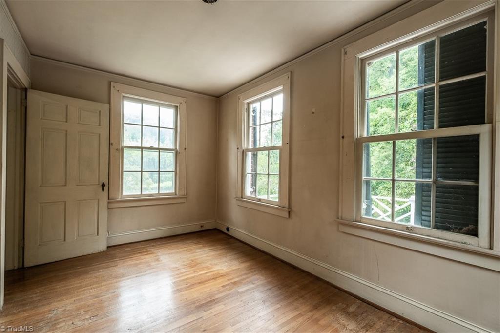 124 Hawthorne Road Elkin, NC 28621 - Photo 27 of 42 Primary bedroom features en-suite bath.