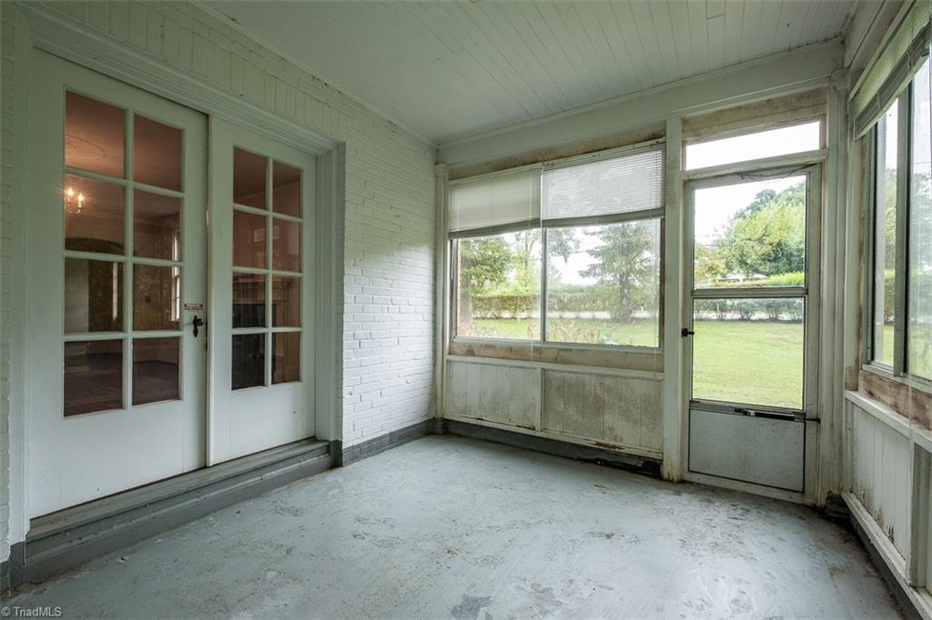 124 Hawthorne Road Elkin, NC 28621 - Photo 35 of 42 Spacious unfinished basement for ample storage.