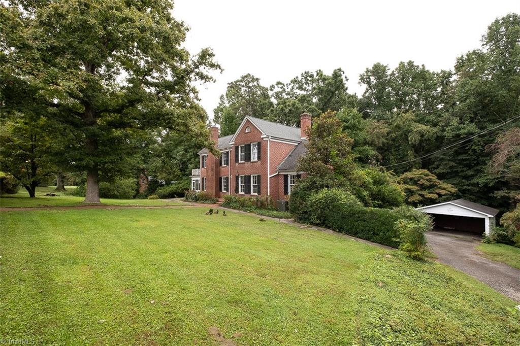 124 Hawthorne Road Elkin, NC 28621 - Photo 38 of 42 Driveway and detached two-car garage.