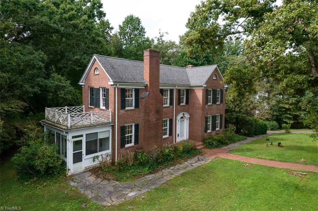 124 Hawthorne Road Elkin, NC 28621 - Photo 4 of 42 Aerial view of home, driveway and detached two-car garage.