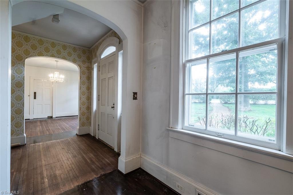 124 Hawthorne Road Elkin, NC 28621 - Photo 6 of 42 From living room, looking into foyer and dining room.