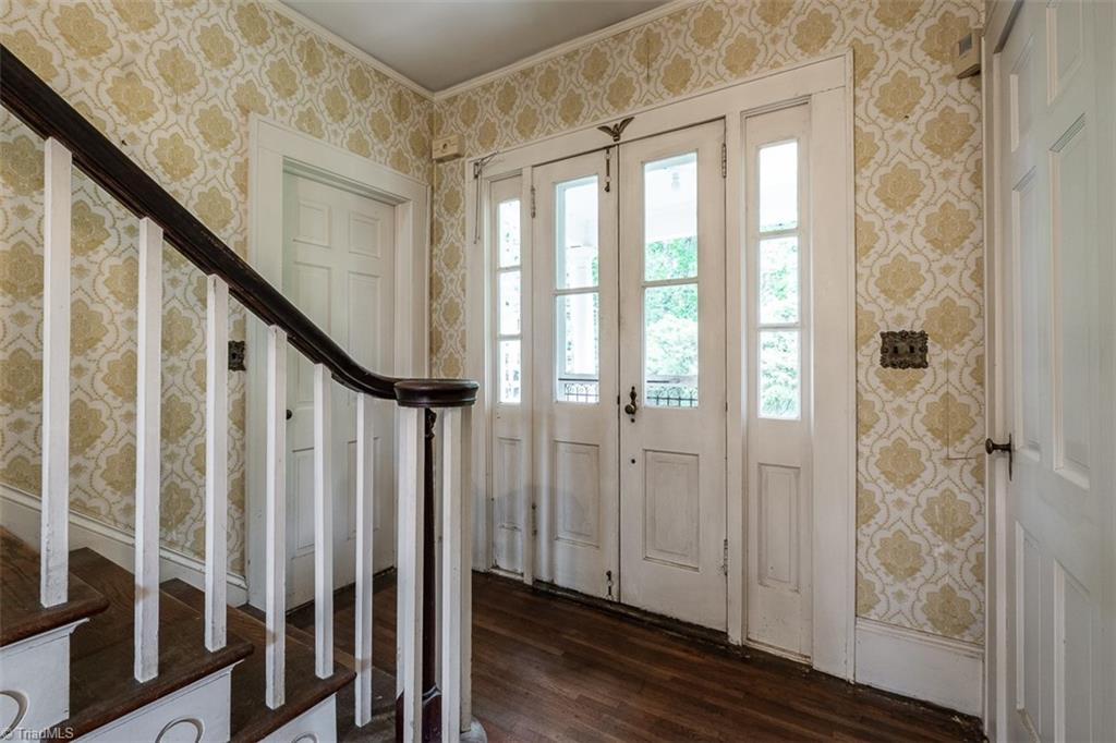 124 Hawthorne Road Elkin, NC 28621 - Photo 7 of 42 Foyer features back entrance and staircase to second level.