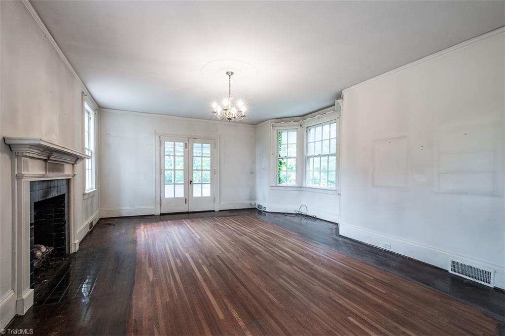 124 Hawthorne Road Elkin, NC 28621 - Photo 10 of 42 Well-appointed formal living room with gas burning fireplace.