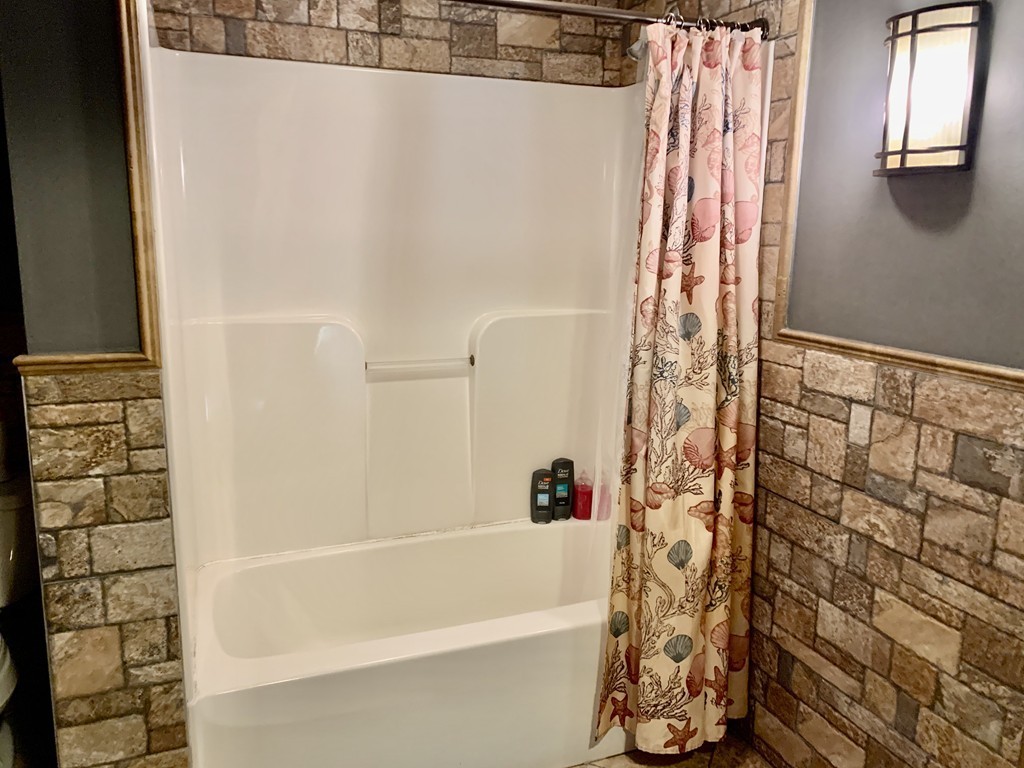 200 Mattapoisett Road Rochester, MA 02770 - Photo 21 of 42 a bathroom with a bathtub and shower