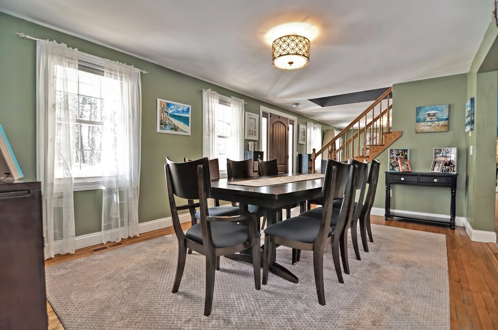 200 Mattapoisett Road Rochester, MA 02770 - Photo 7 of 42 a view of a dining room with furniture and a large window