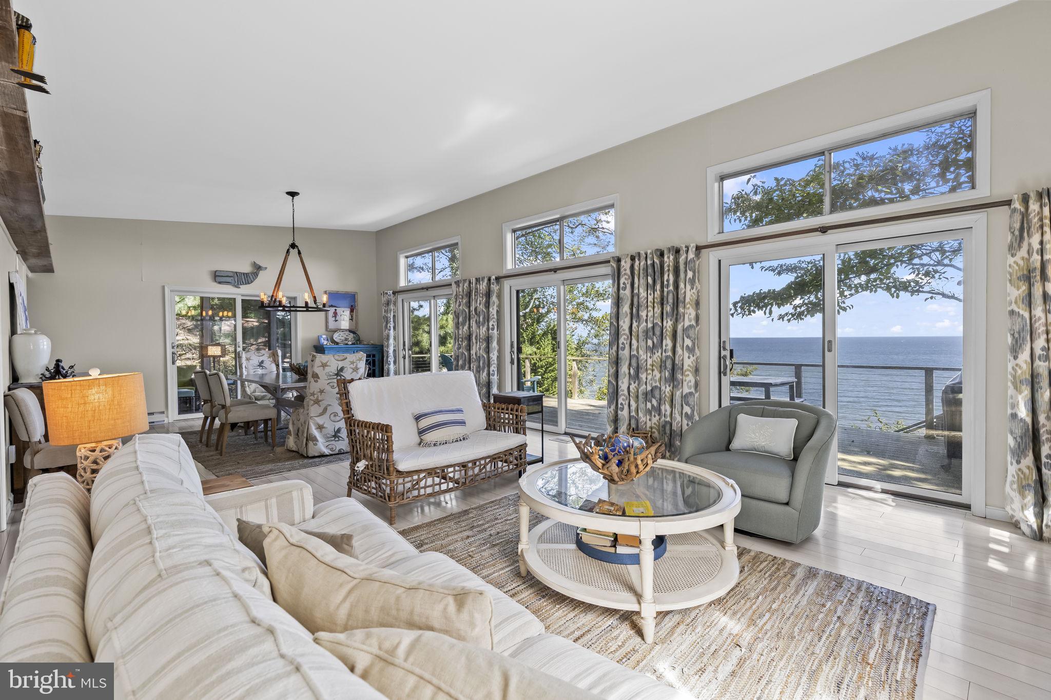 1928 Elm Road Port Republic, MD 20676 - Photo 12 of 48 a living room with furniture and a large window