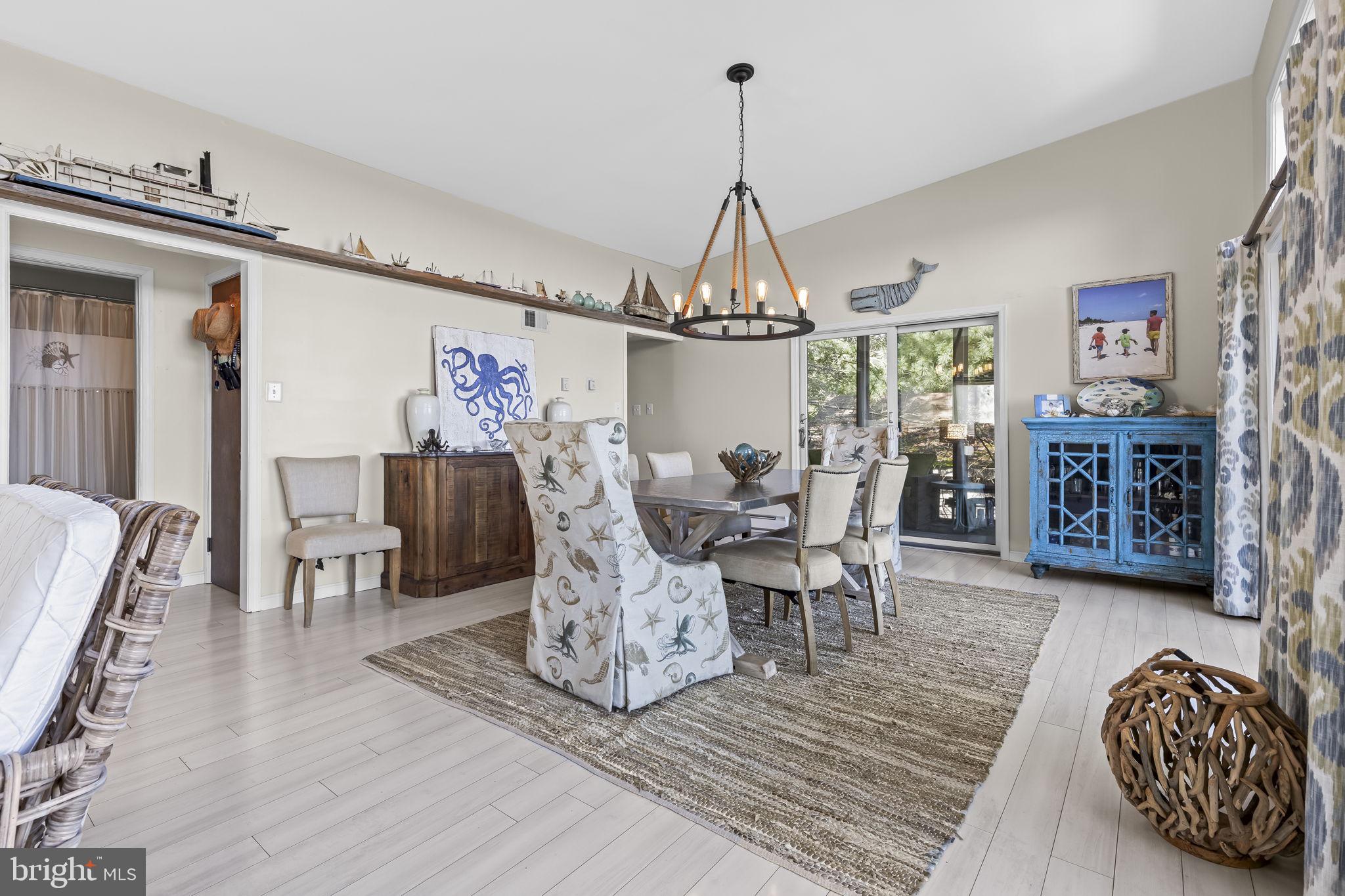 1928 Elm Road Port Republic, MD 20676 - Photo 15 of 48 a view of a livingroom with furniture and chandelier