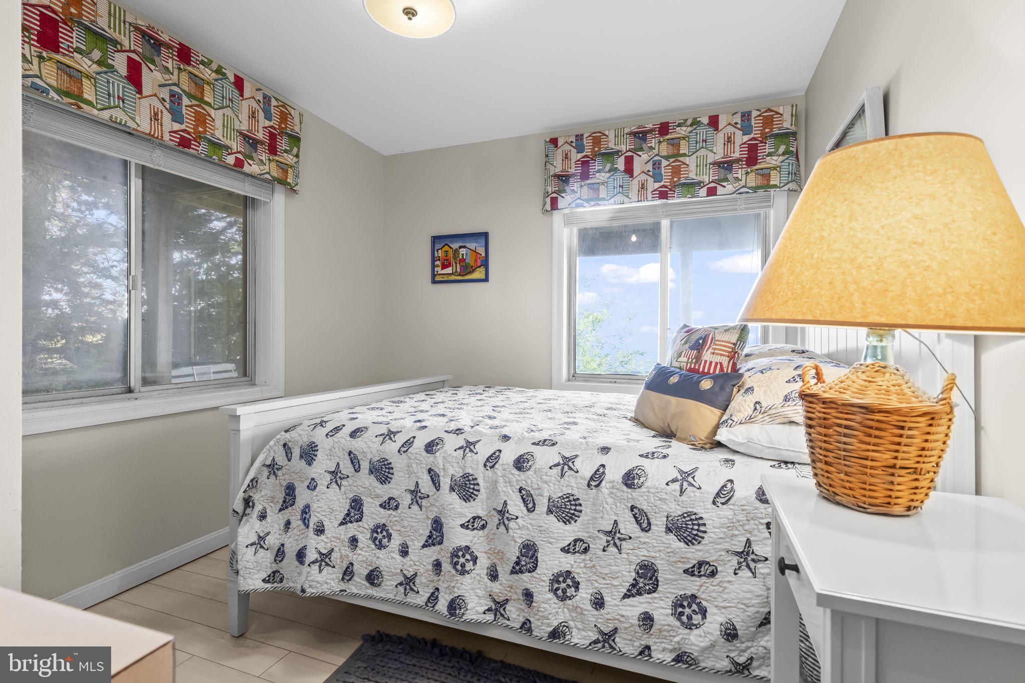 1928 Elm Road Port Republic, MD 20676 - Photo 25 of 48 a bedroom with a bed and a window