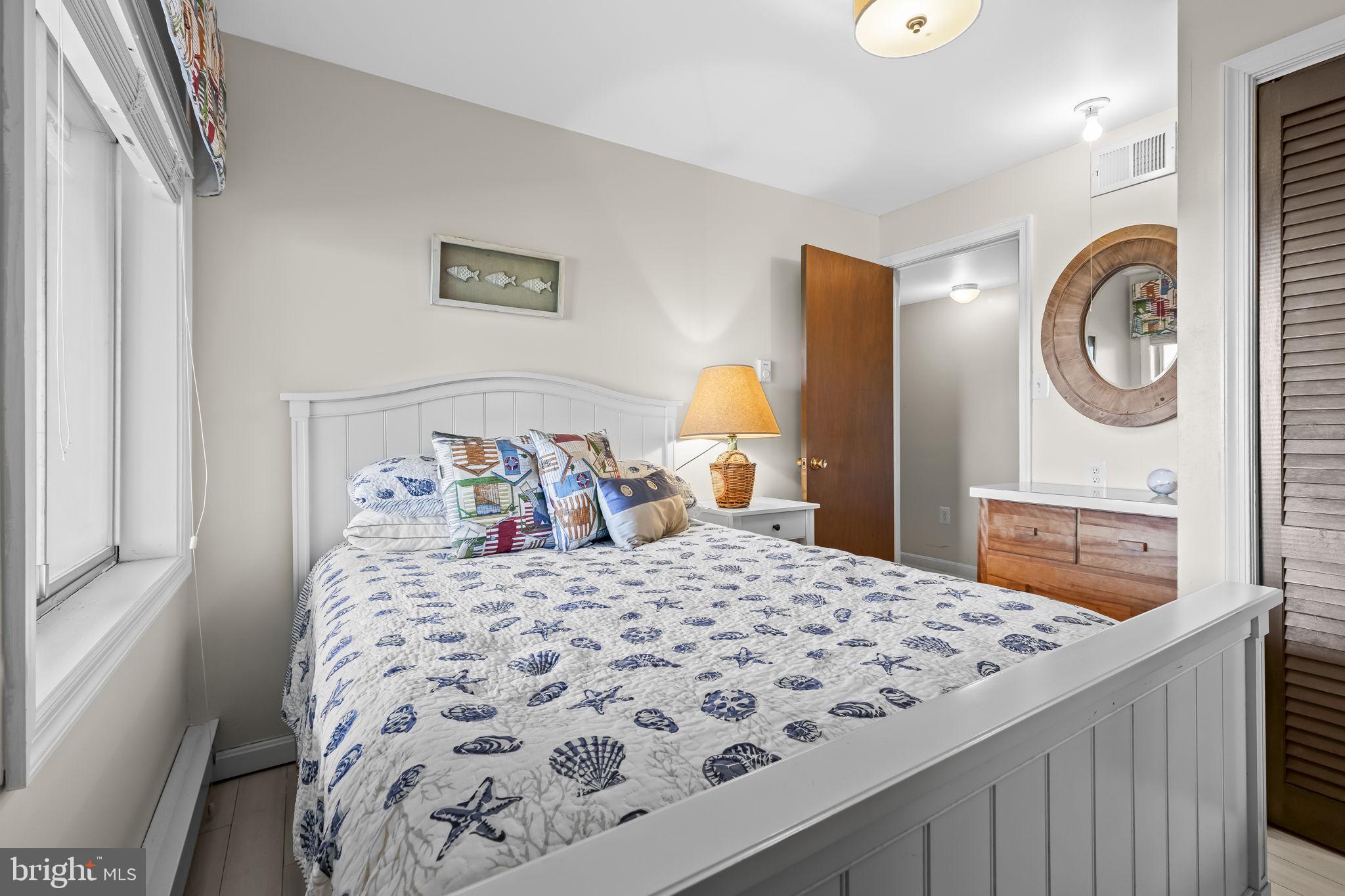 1928 Elm Road Port Republic, MD 20676 - Photo 26 of 48 a bedroom with a bed and a dresser