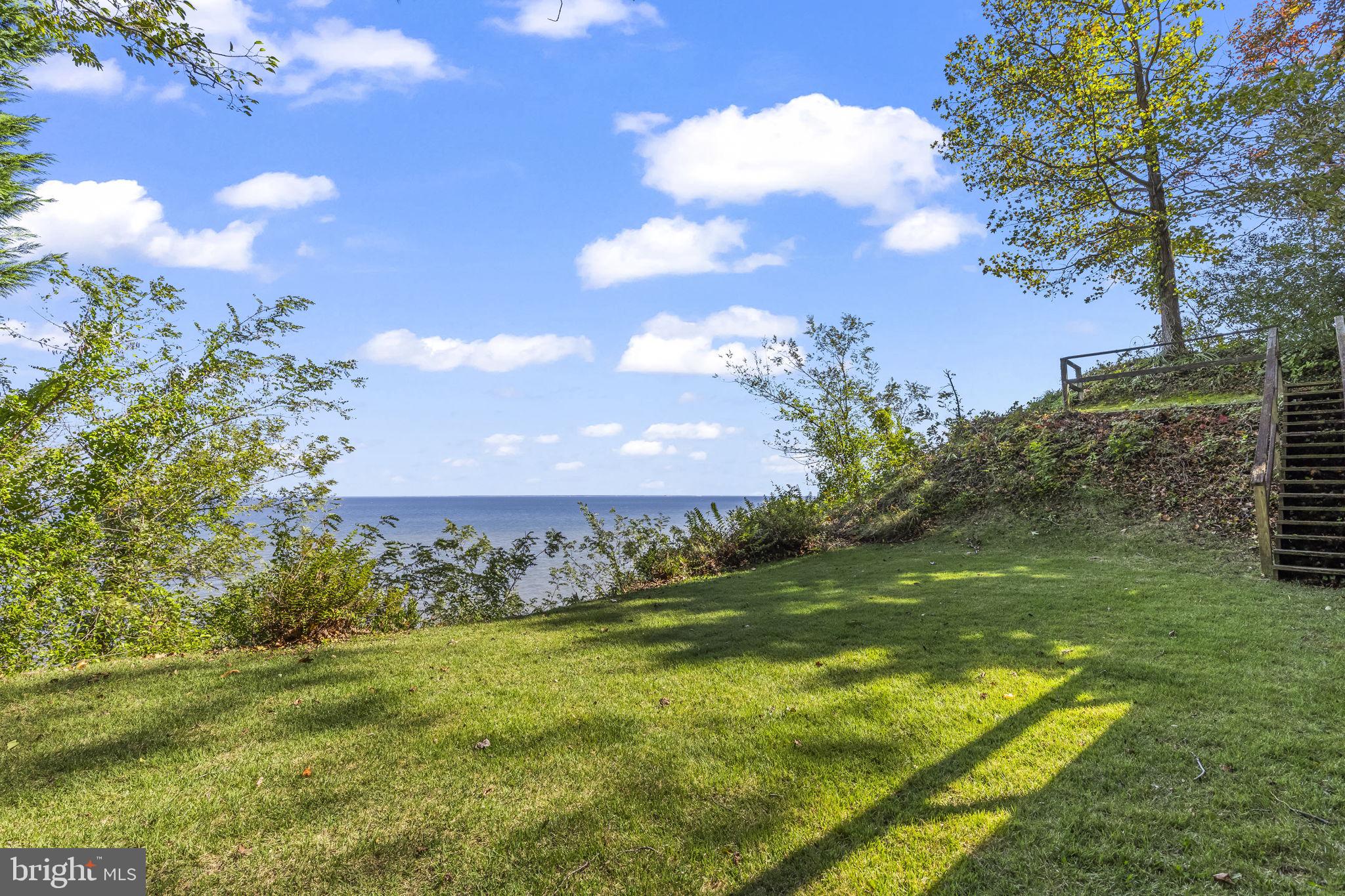1928 Elm Road Port Republic, MD 20676 - Photo 36 of 48 a view of a big yard with lots of green space