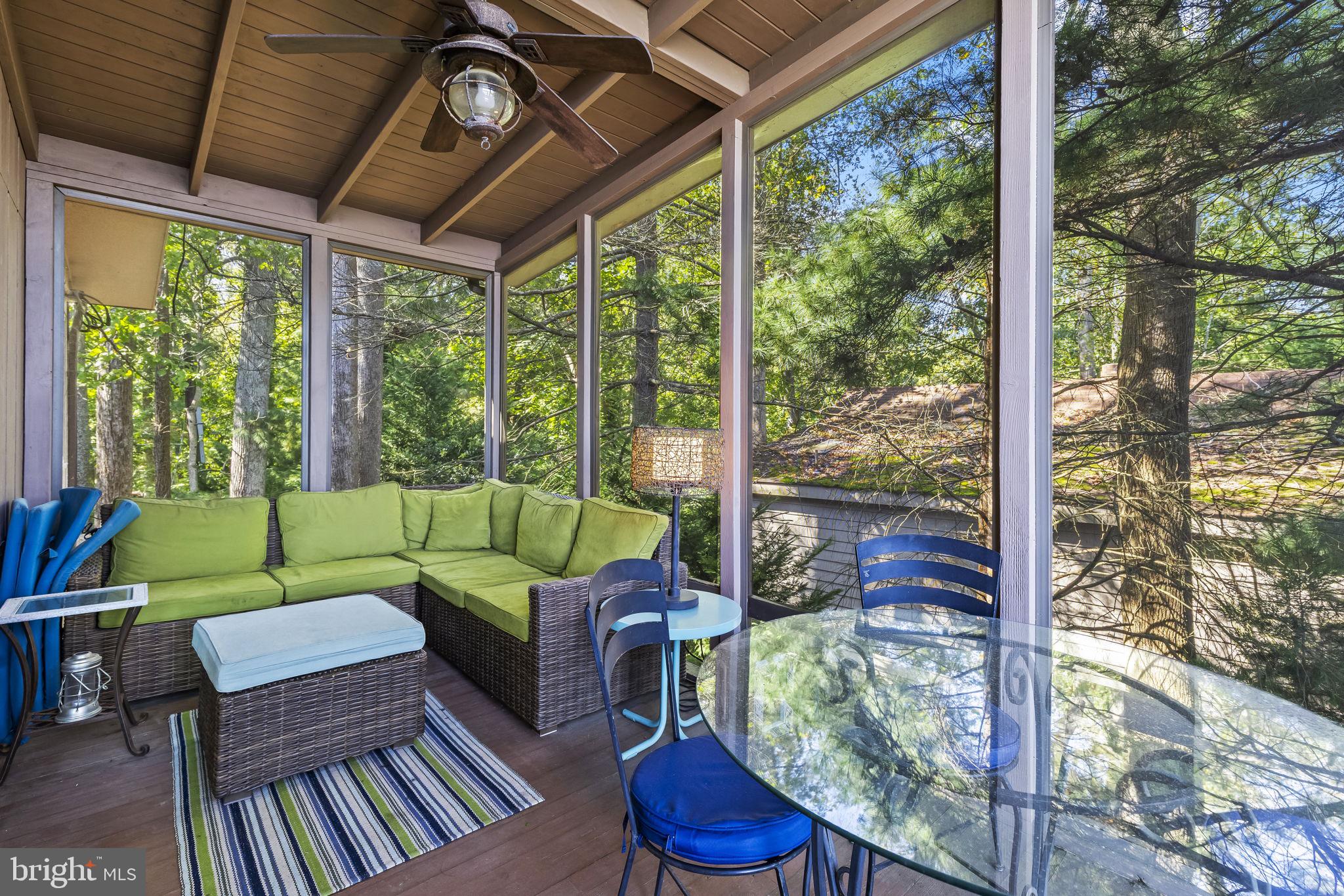 1928 Elm Road Port Republic, MD 20676 - Photo 5 of 48 a living room with furniture and a large window