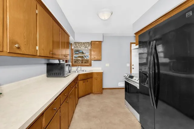 $319,900 | 6911 East River Road, Fridley, MN 55432