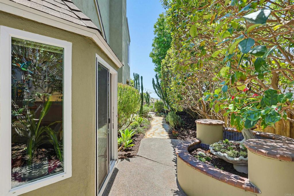 2756 Southampton Road Carlsbad, CA 92010 - Photo 26 of 40 a front view of a house with a yard
