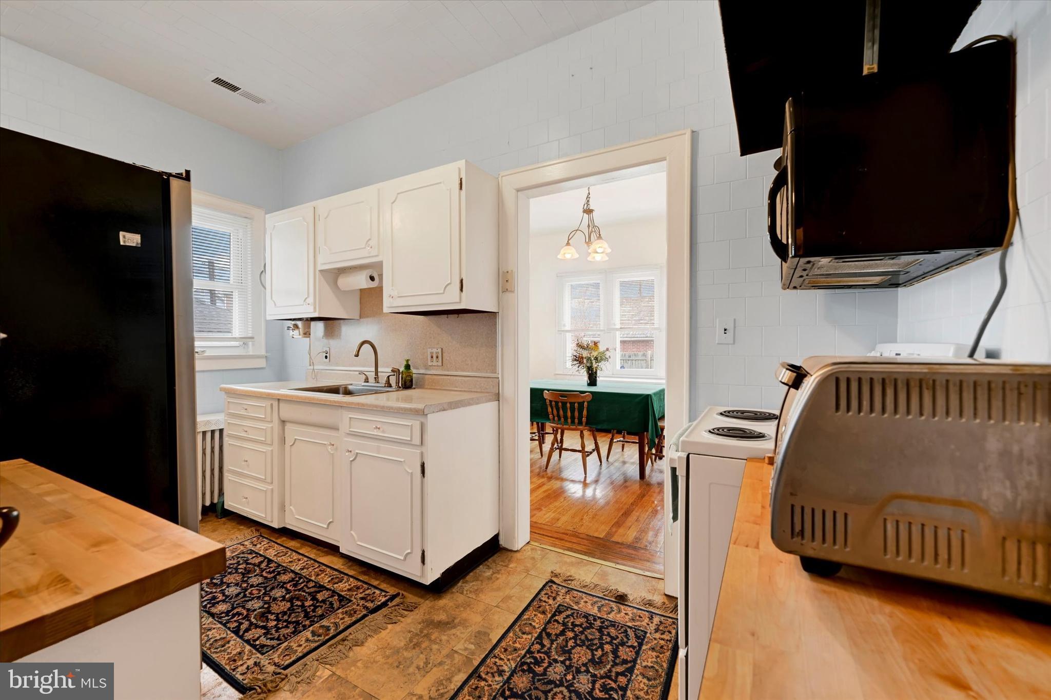 5 Liberty Parkway Baltimore, MD 21222 - Photo 6 of 31 a kitchen with a sink appliances and cabinets
