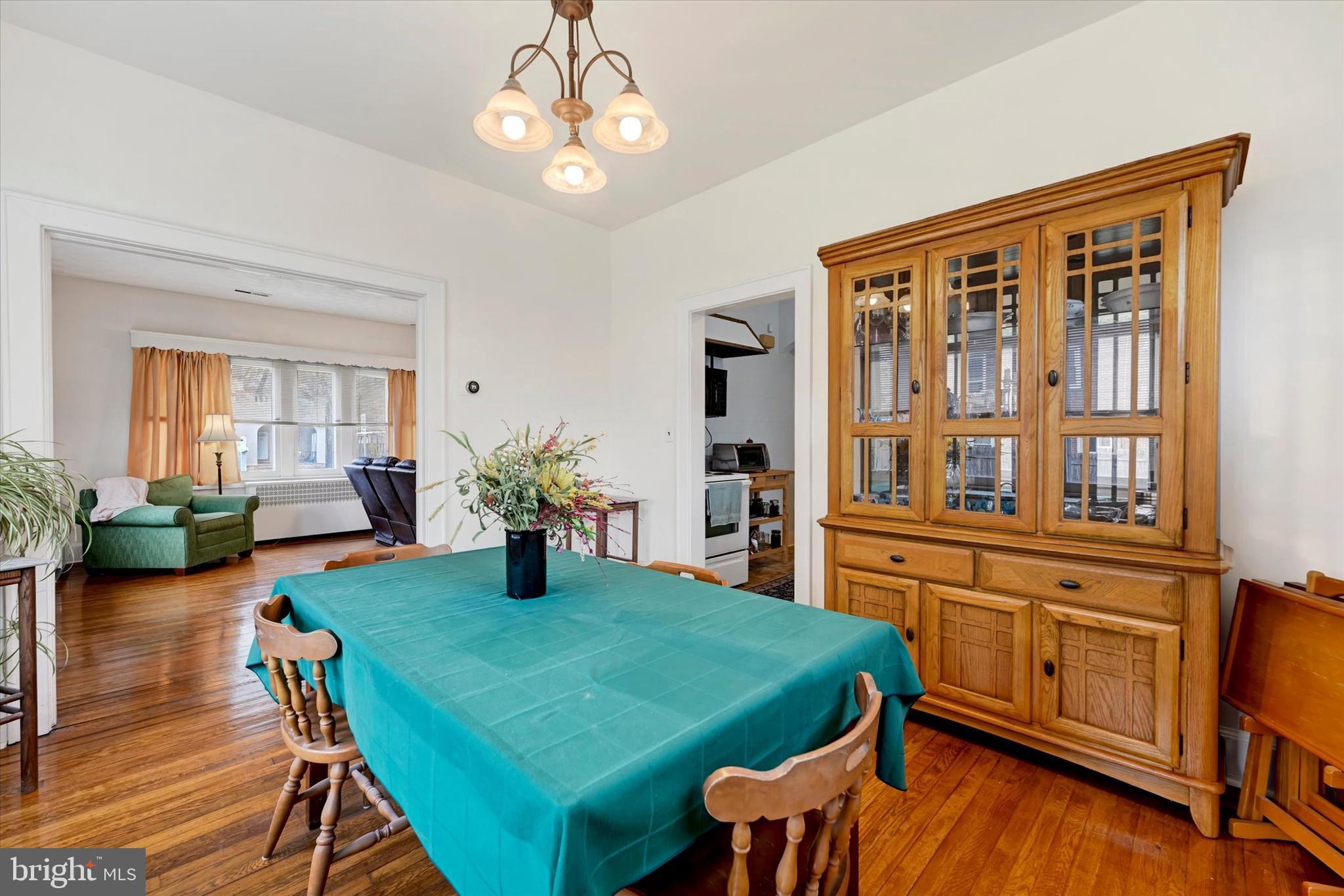 5 Liberty Parkway Baltimore, MD 21222 - Photo 8 of 31 a view of a dining room with furniture window and wooden floor