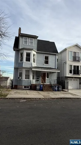 a front view of a building with street
