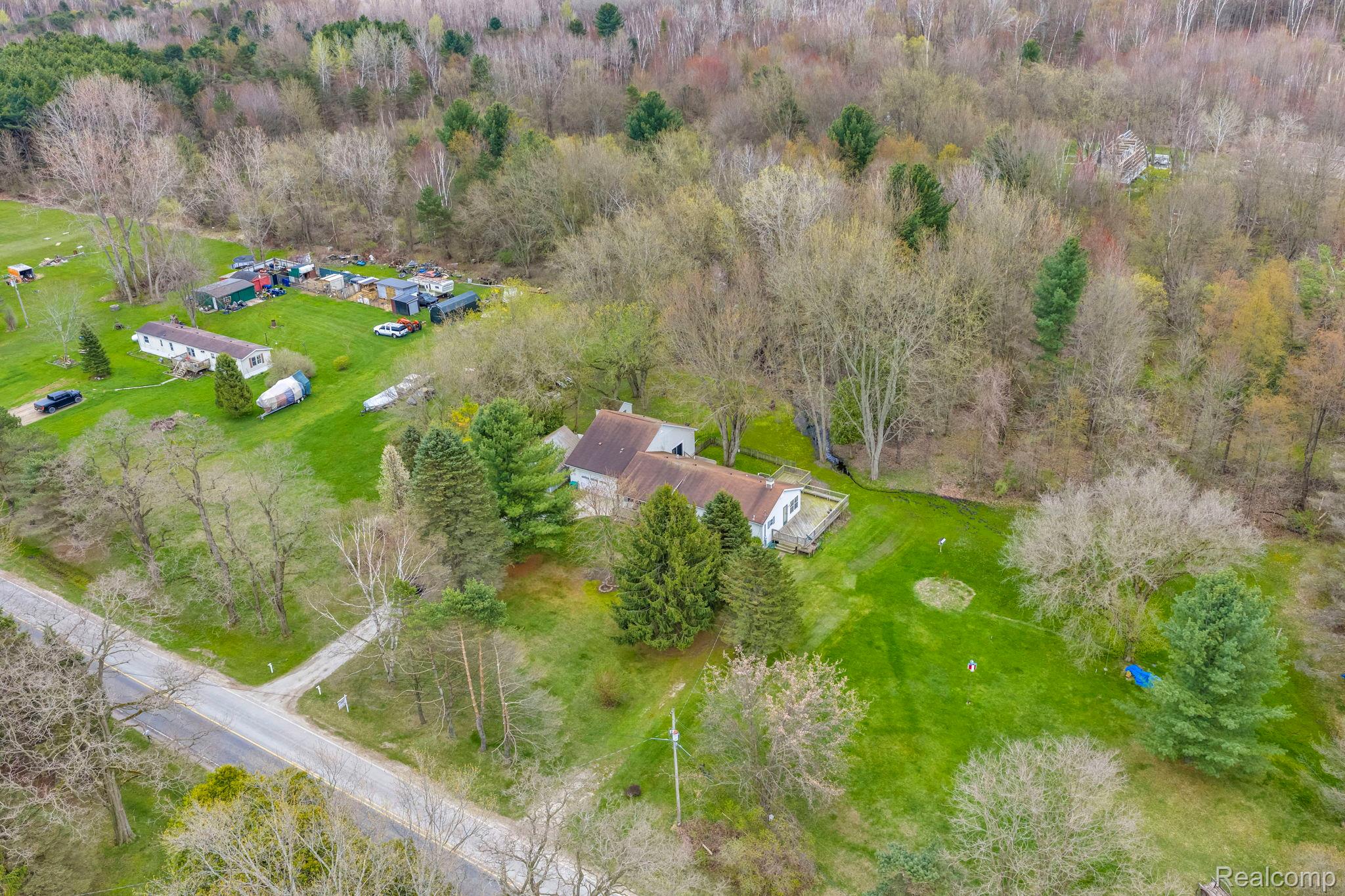 6562 Custer Road Port Sanilac, MI 48469 - Photo 7 of 56 Drone / aerial view of a forest